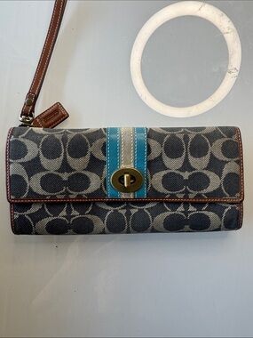 Coach Signature Denim Canvas turnlock with cognac leather wristlet and hangtag
